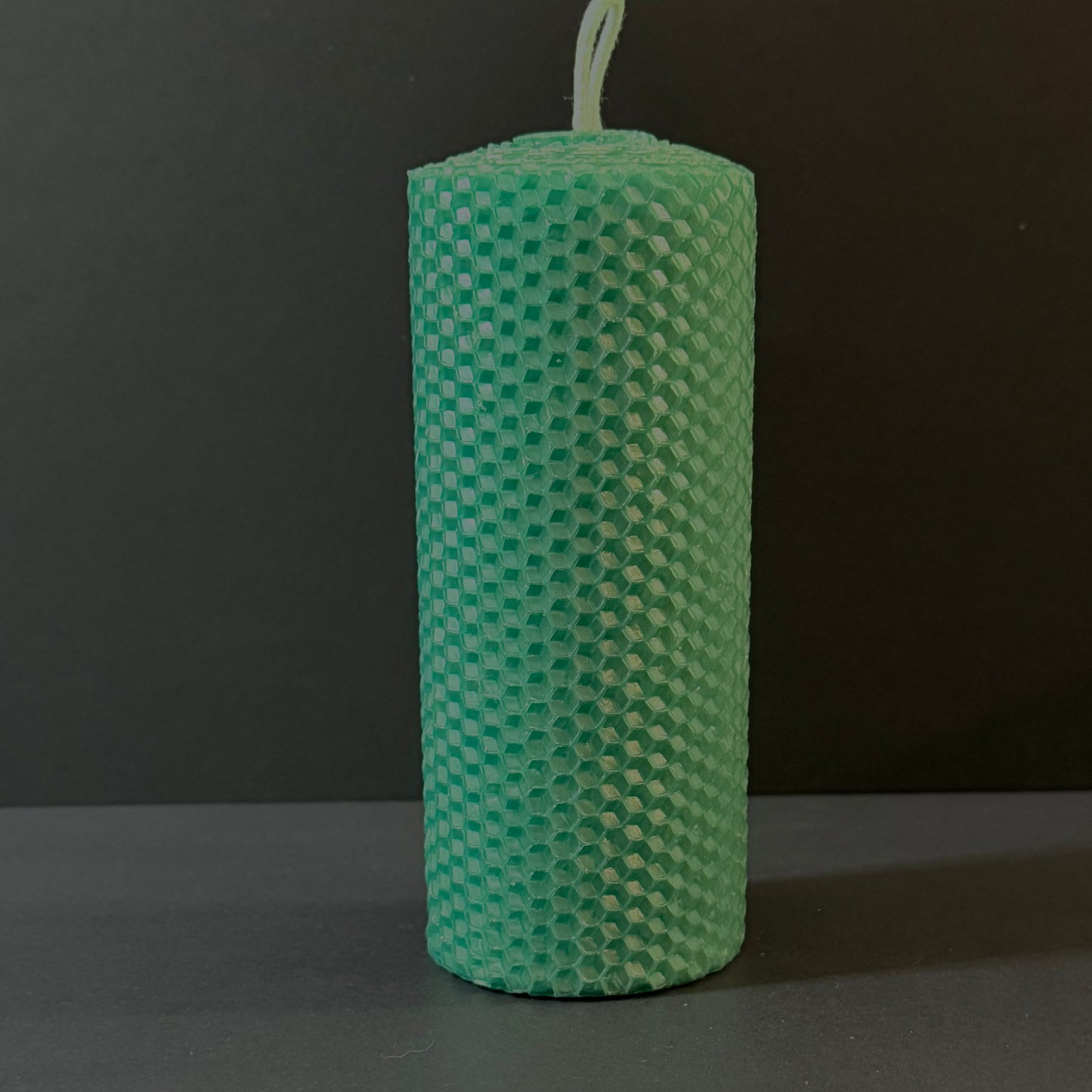 Our emerald natural candle glistens with a rich, jewel-toned medium green, evoking the timeless beauty of precious gemstones-perfect for a luxe, sophisticated ambiance.