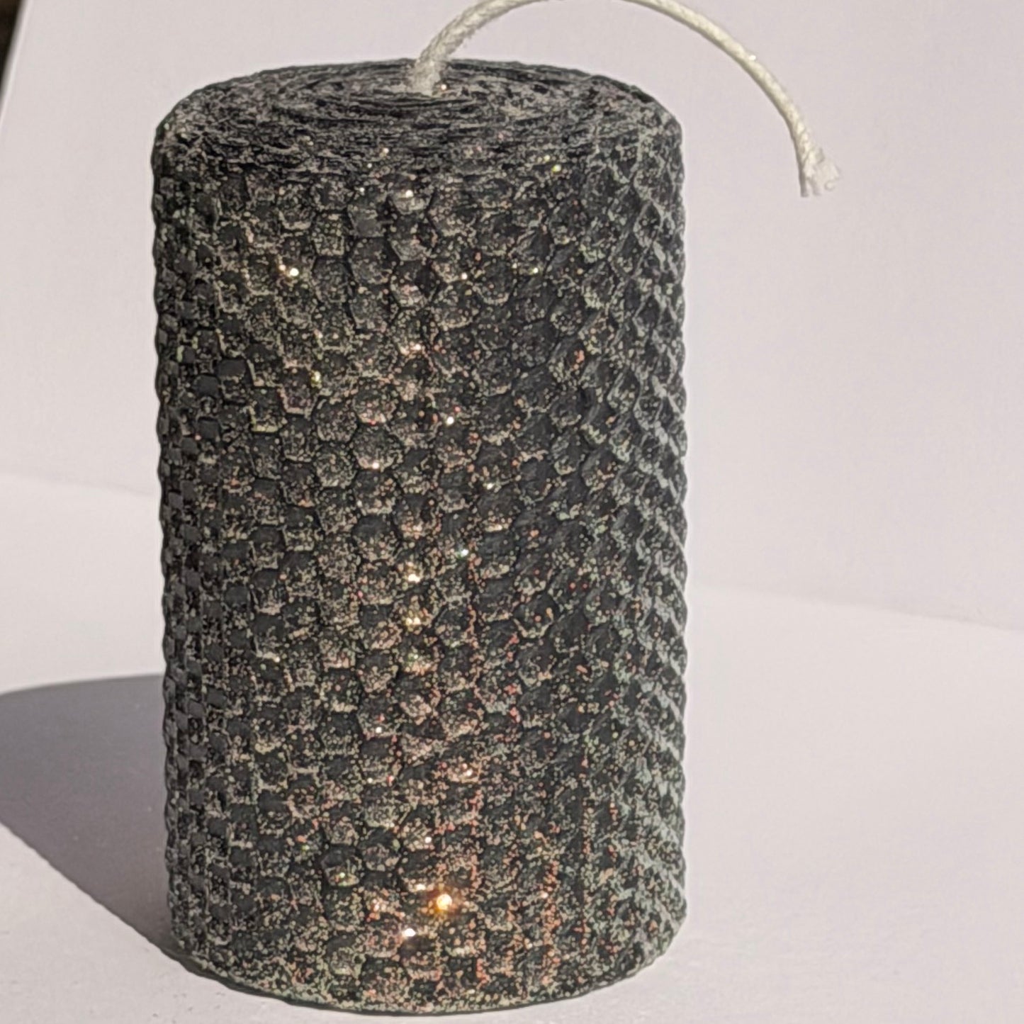 Our black classic glitter exudes a sleek, mysterious elegance, wrapped in opalescent glitter with a gold undertone-infusing your space with a bold, dramatic sparkle that is both timeless and captivating.