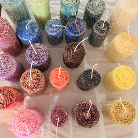 Also called our “Sugared” line… The wax color underneath shows through a dusting of opalescent glitter with a gold undertone. . . Giving the candles a sugar plum type look with a lovely golden hue. Our candles are handmade, hand rolled made to order.