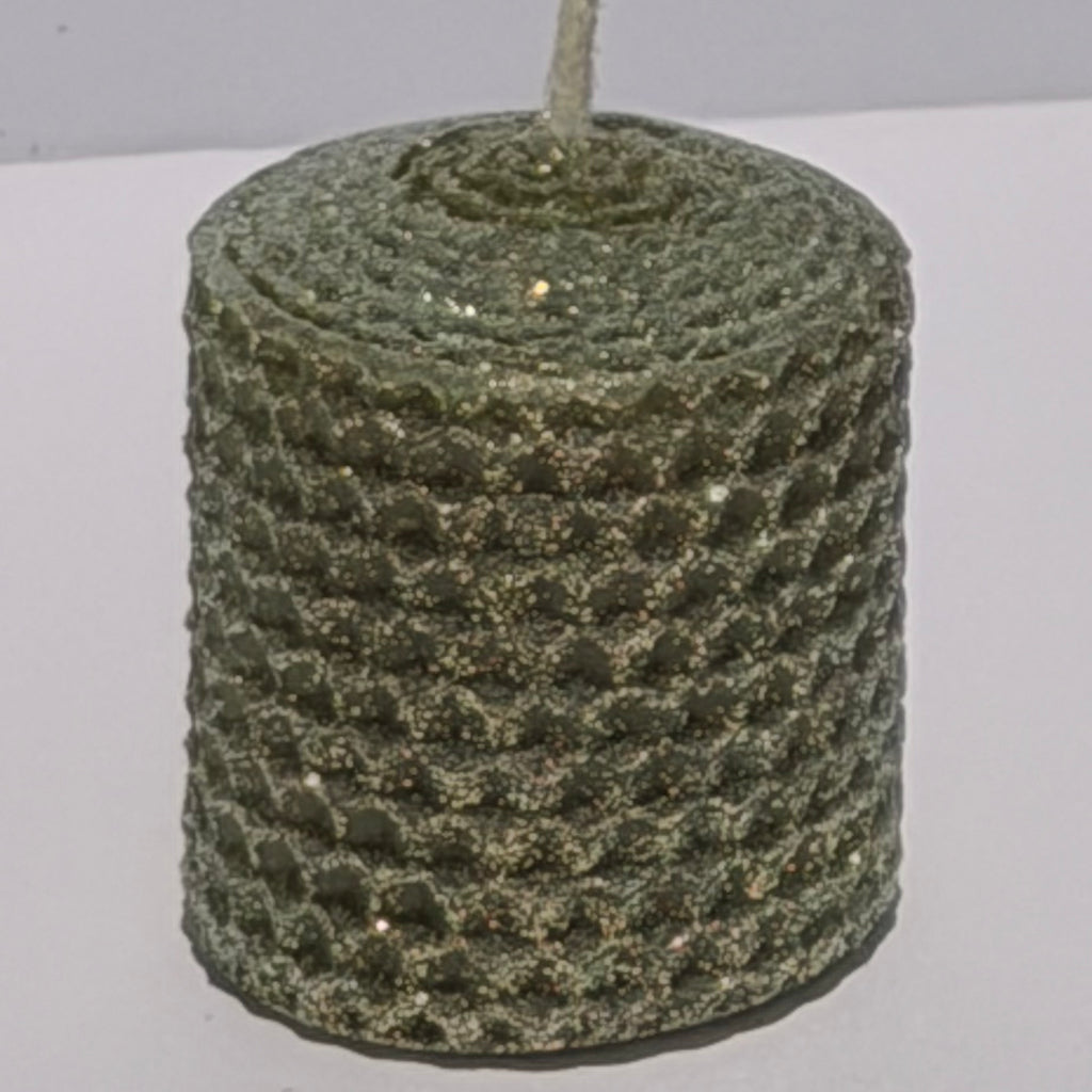 Our Olive Limited Edition candle features a rich, muted green, softly dusted with our classic opalescent glitter with a golden undertone-allowing the natural depth of the wax to glow through with a subtle, luminous shimmer. This exclusive hue brings a refined, earthy elegance with a fleeting touch of sparkle.