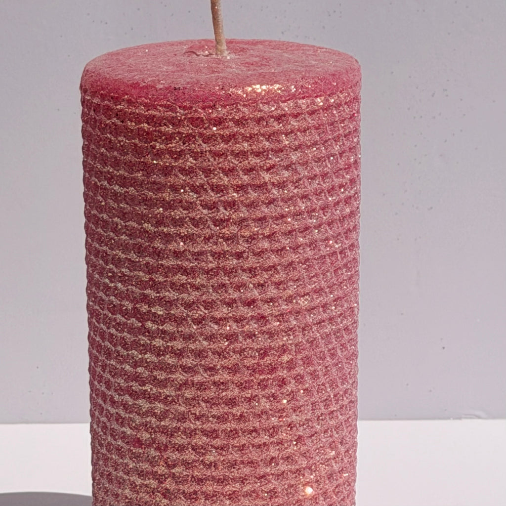 Our Hot Pink Classic Glitter Limited Edition Candle is a bold expression of vibrant elegance. Hand-rolled from natural beeswax, it radiates a striking hot pink hue that instantly energizes any space. Finished with a dusting of our signature Classic iridescent glitter, it shimmers beautifully with a soft golden undertone, catching the light from every angle.

Playful yet refined, this limited edition adds a lively pop of color and sparkle-perfect for making a statement while it lasts.