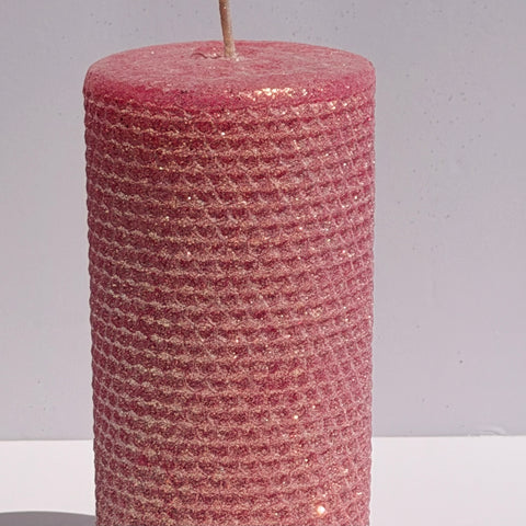 Our Hot Pink Classic Glitter Limited Edition Candle is a bold expression of vibrant elegance. Hand-rolled from natural beeswax, it radiates a striking hot pink hue that instantly energizes any space. Finished with a dusting of our signature Classic iridescent glitter, it shimmers beautifully with a soft golden undertone, catching the light from every angle.

Playful yet refined, this limited edition adds a lively pop of color and sparkle-perfect for making a statement while it lasts.