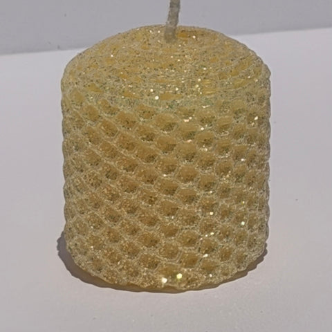 Our Antique White Limited Edition Candle is a timeless classic. Hand-rolled from natural beeswax, it exudes a delicate white with a antique, aged yellow undertone. Finished with a dusting of our classic iridescent glitter, it softly glimmers with a golden sheen, evoking a sense of vintage charm and quiet elegance.