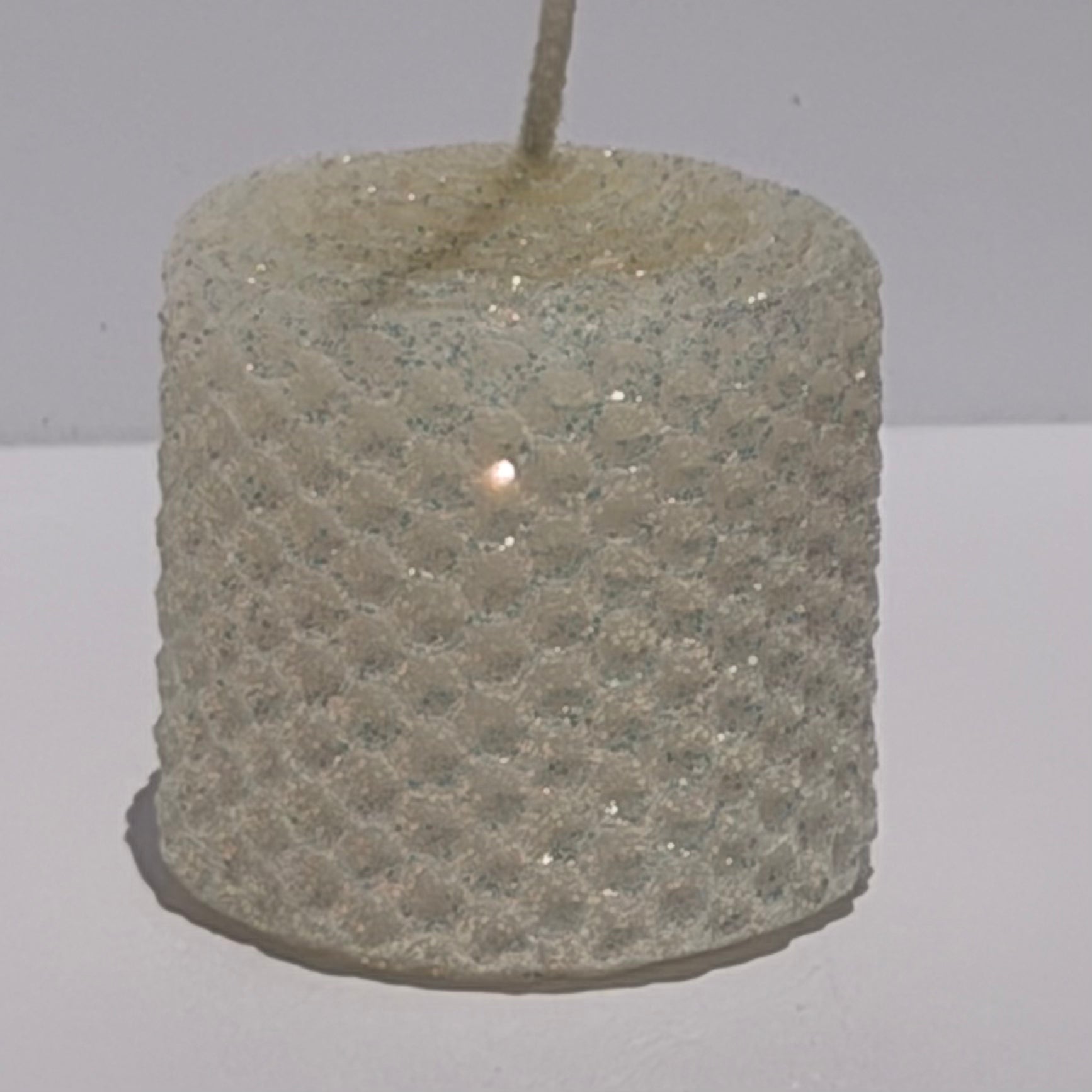Our ivory classic glitter offers a timeless, pale ivory glow, wrapped in opalescent glitter with a golden undertone-infusing your space with a refined, understated sparkle that is pure elegance.