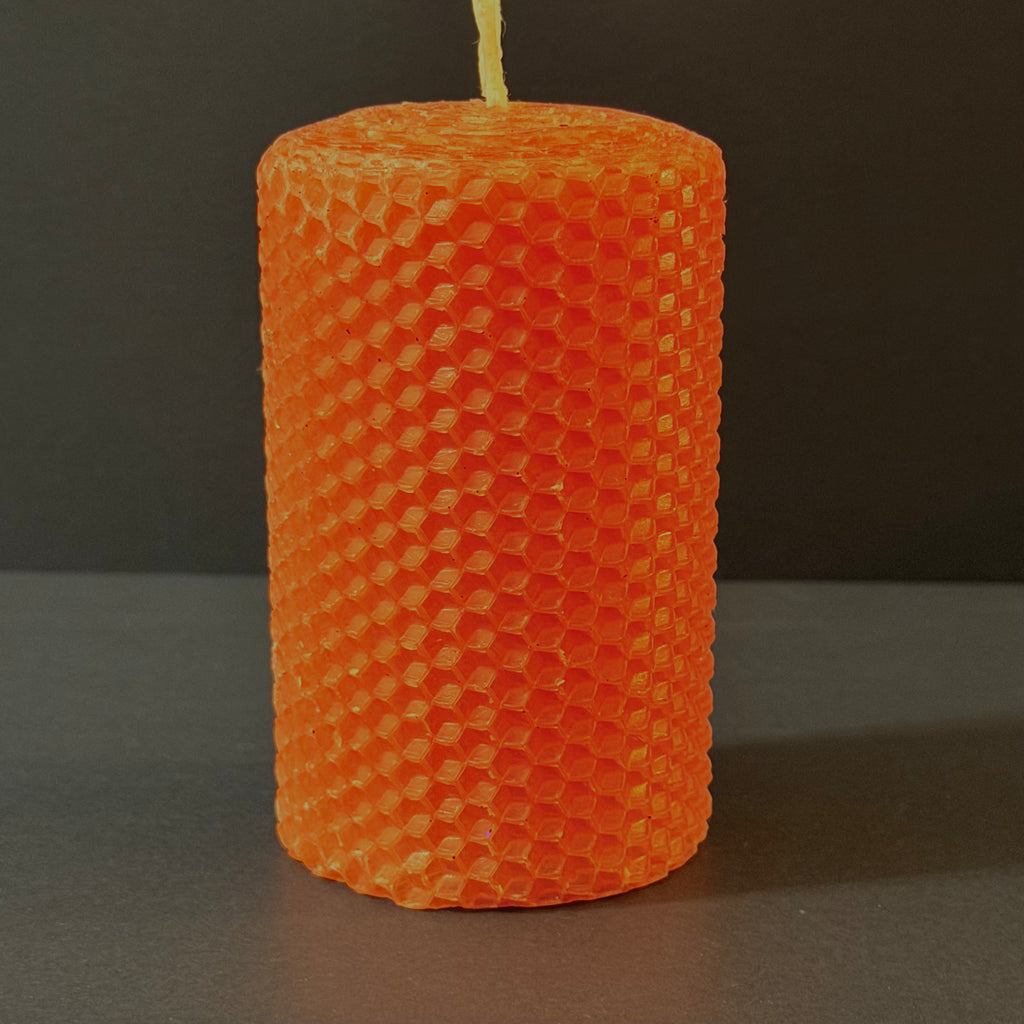 Our persimmon natural candle radiates a vibrant, bright orange glow, like a ripe autumn fruit-infusing your space with a lively, energetic warmth perfect for brightening any season.