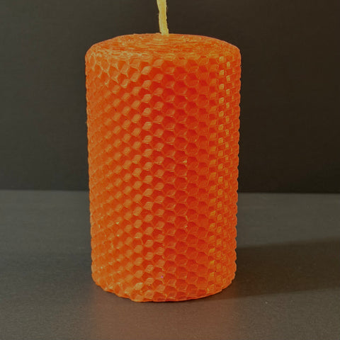 Our persimmon natural candle radiates a vibrant, bright orange glow, like a ripe autumn fruit-infusing your space with a lively, energetic warmth perfect for brightening any season.
