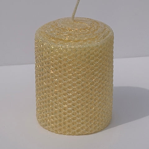 Our Antique White Limited Edition Candle is a timeless classic. Hand-rolled from natural beeswax, it exudes a delicate white with a antique, aged yellow undertone. Finished with a dusting of our classic iridescent glitter, it softly glimmers with a golden sheen, evoking a sense of vintage charm and quiet elegance.