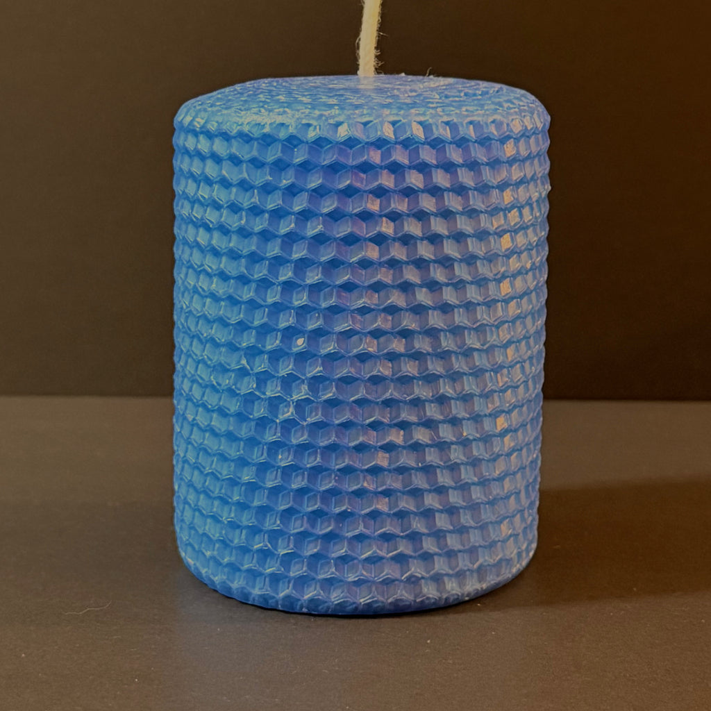 Our blue natural candle exudes a soft, tranquil azure glow, like a calm evening sky, bringing a peaceful, cooling elegance to your space.