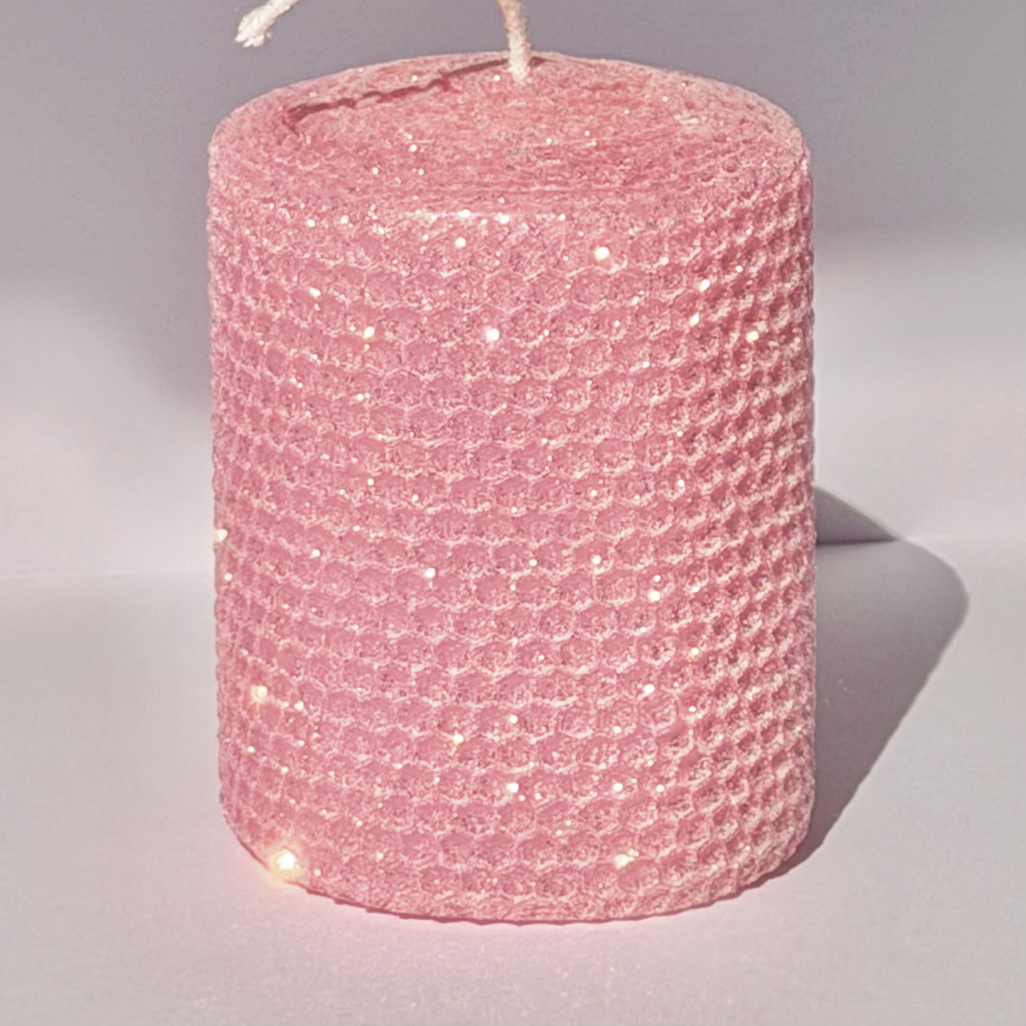 Our pink classic glitter radiates a soft, cheerful pink, wrapped in opalescent glitter and a gold undertone-infusing your space with a bright, uplifting sparkle perfect for any joyful occasion.