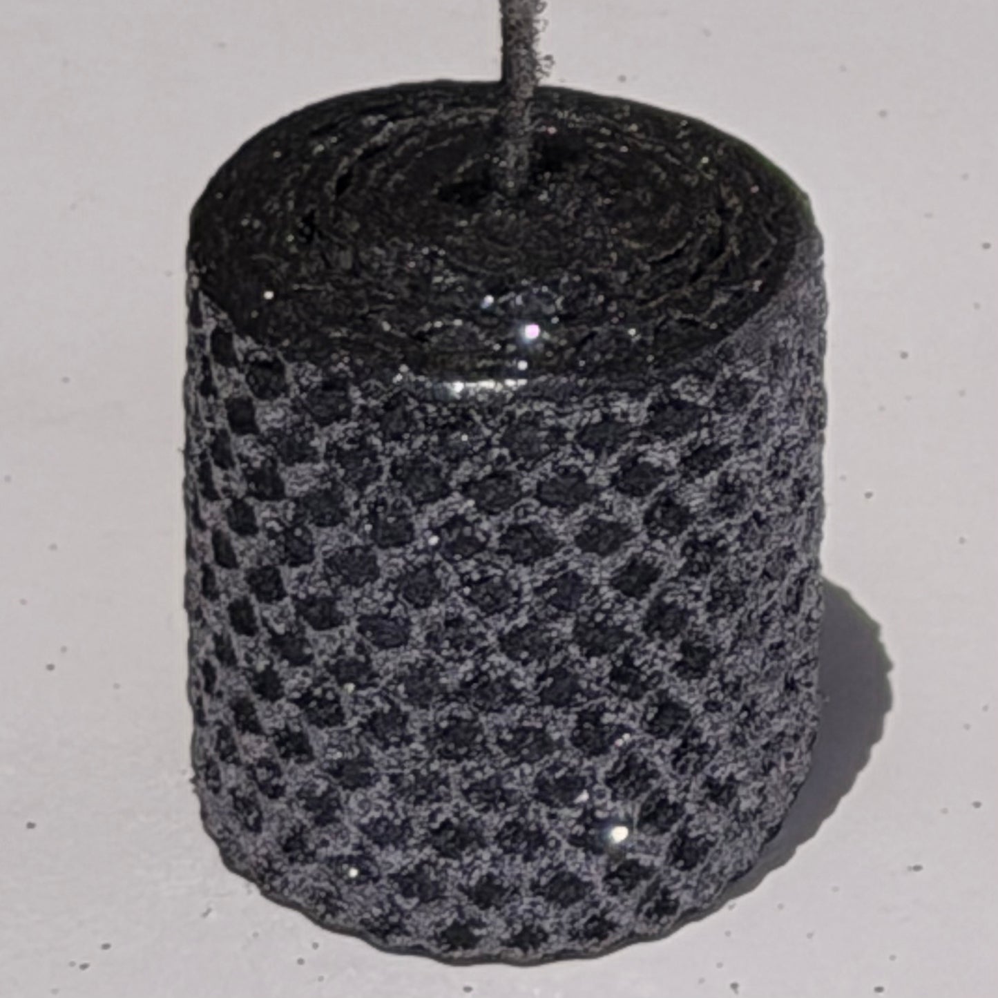 Add a touch of modern elegance with our Graphite Metallic Glitter Candles. Inspired by the sleek depth of pencil lead, these candles are a rich graphite gray, coated in a dazzling metallic glitter that catches the light and enhances every subtle curve. Perfect for adding a refined, luminous accent to any dinner or special event.