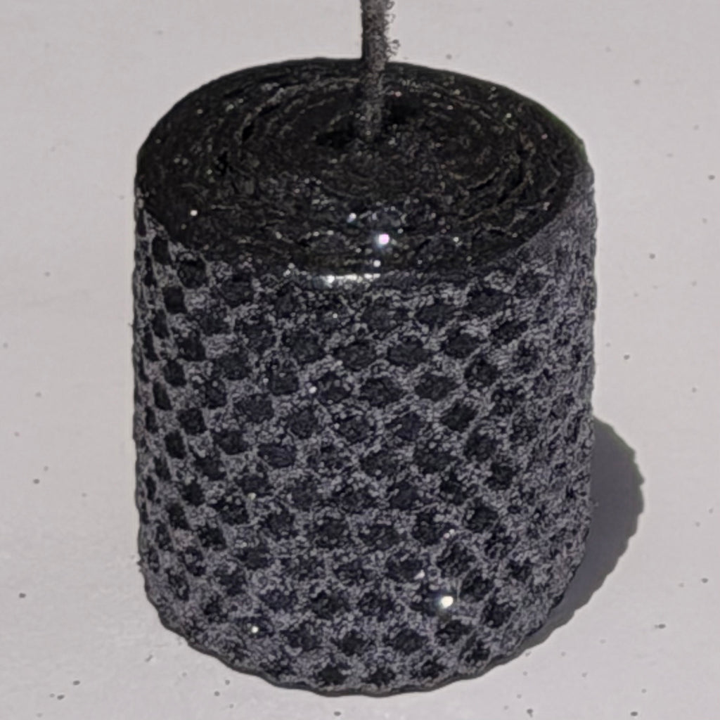 Add a touch of modern elegance with our Graphite Metallic Glitter Candles. Inspired by the sleek depth of pencil lead, these candles are a rich graphite gray, coated in a dazzling metallic glitter that catches the light and enhances every subtle curve. Perfect for adding a refined, luminous accent to any dinner or special event.