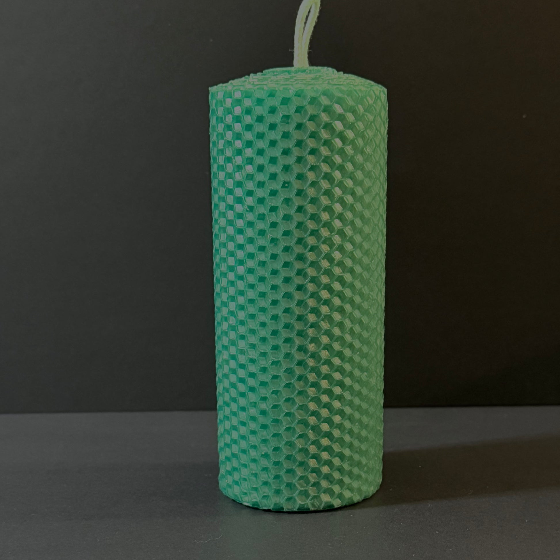 Our emerald natural candle glistens with a rich, jewel-toned medium green, evoking the timeless beauty of precious gemstones-perfect for a luxe, sophisticated ambiance.