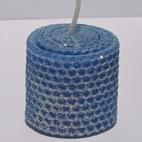 Our blue classic glitter candle radiates a soft, serene azure, wrapped in opalescent glitter with a golden undertone-infusing your space with a tranquil, sparkling elegance.