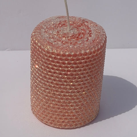 Our Light Salmon Limited Edition Candle is a graceful statement of warmth. Hand-rolled from natural beeswax, it shines in a pale Salmon hue, a soft, fresh color with just a hint of sweetness. Dusted in our signature classic iridescent glitter, it softly glimmers with a golden undertone, bringing a radiant, serene glow to any setting.