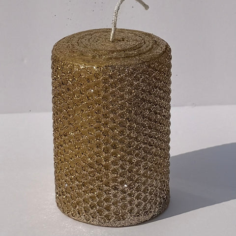 Illuminate your space with our Mercury Specialty Candle, hand-rolled from pure golden beeswax. This radiant candle is adorned with a delicate dusting of metallic glitter, a shimmering blend of silver and gold, allowing the warm glow of beeswax to peek through. Perfect for adding a touch of celestial elegance to any evening.