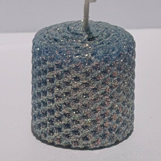 Our denim blue classic glitter exudes a deep, timeless blue, wrapped in an opalescent glitter with a golden undertone-evoking the classic comfort of denim with a sparkling, elegant twist.