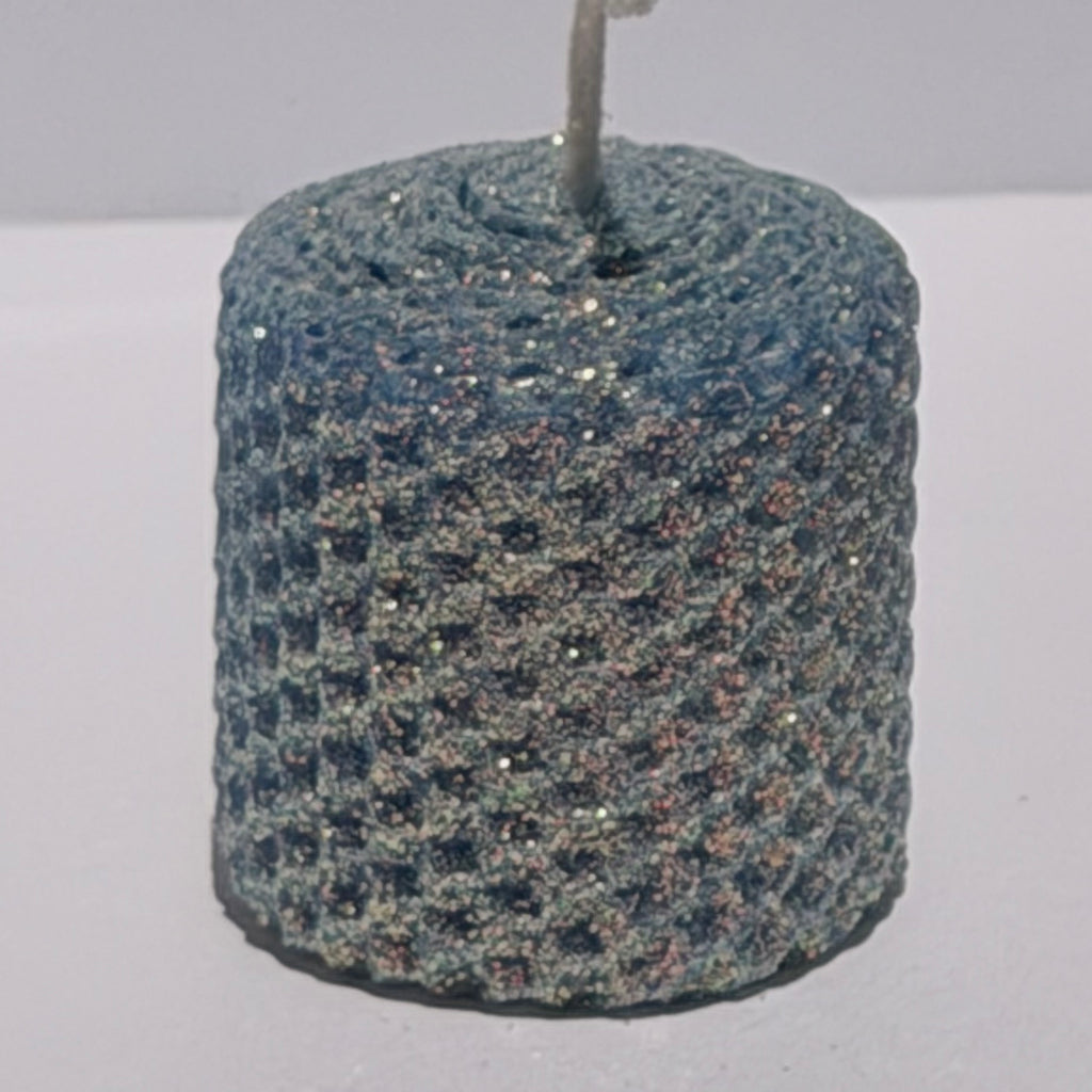 Our denim blue classic glitter exudes a deep, timeless blue, wrapped in an opalescent glitter with a golden undertone-evoking the classic comfort of denim with a sparkling, elegant twist.
