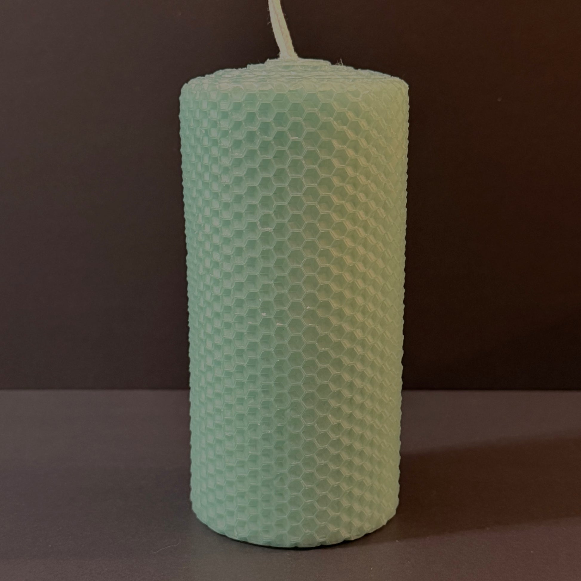 Our aqua natural candle glows with a refreshing, pale blue-green radiance, evoking the serene sparkle of tropical waters-perfect for a tranquil, invigorating atmosphere.