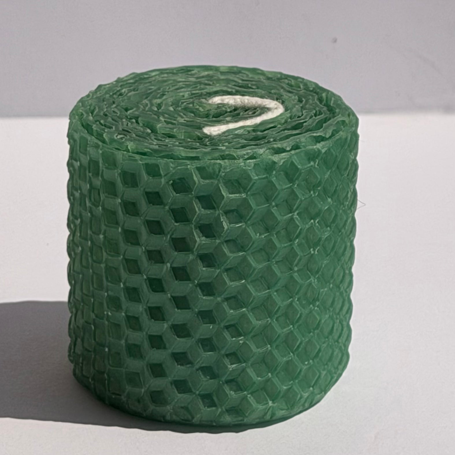 Our emerald natural candle glistens with a rich, jewel-toned medium green, evoking the timeless beauty of precious gemstones-perfect for a luxe, sophisticated ambiance.