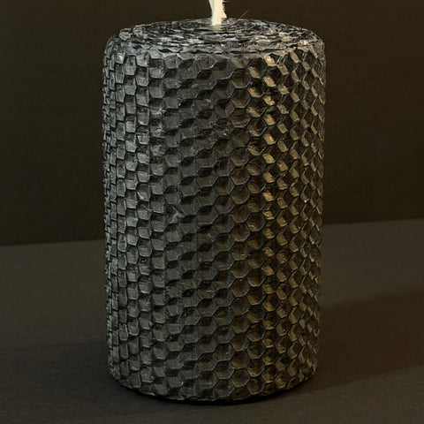 Our black natural candle exudes a sleek, mysterious elegance, with a deep, midnight hue that brings a bold, dramatic sophistication to any space.